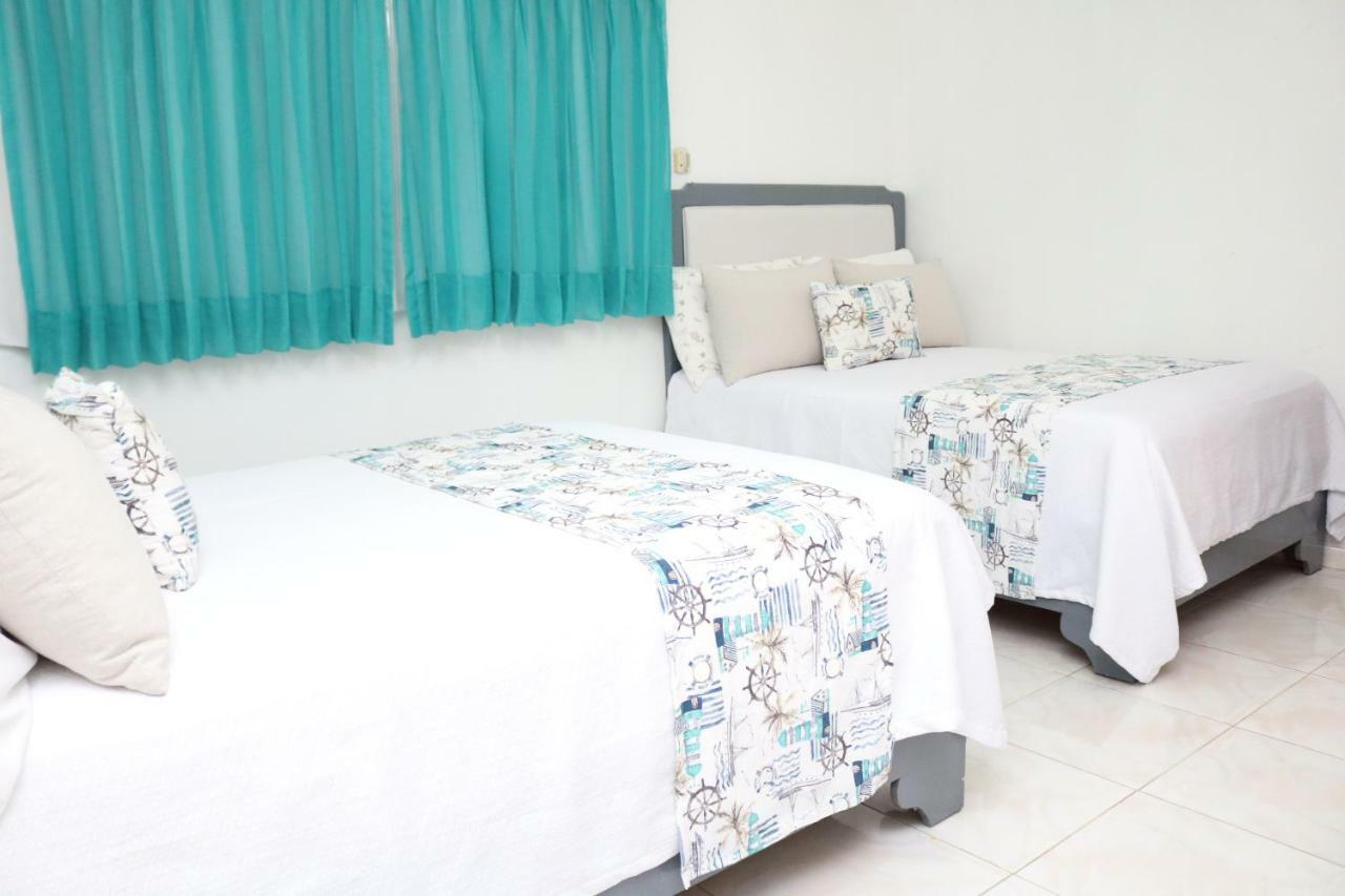 Hotel Villas Del Mar เปเดร์นาเลส ภายนอก รูปภาพ